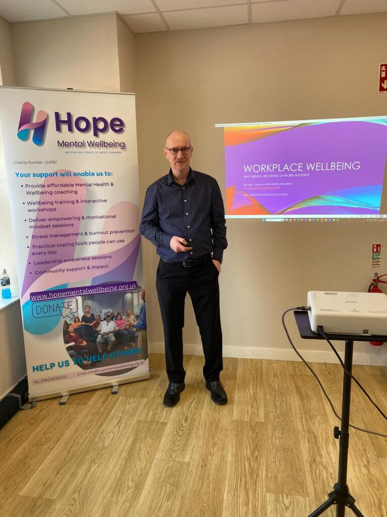 Sam Barr presenting a workplace wellbeing session